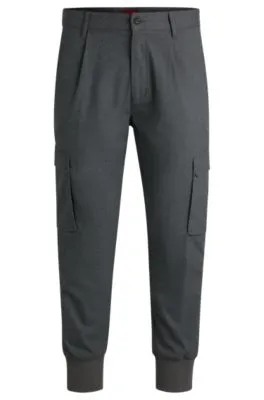 Pantalones slim fit en sarga elástica jaspeada