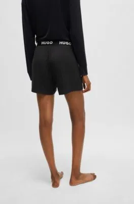 Shorts de pijama en punto elástico con logo en la cintura