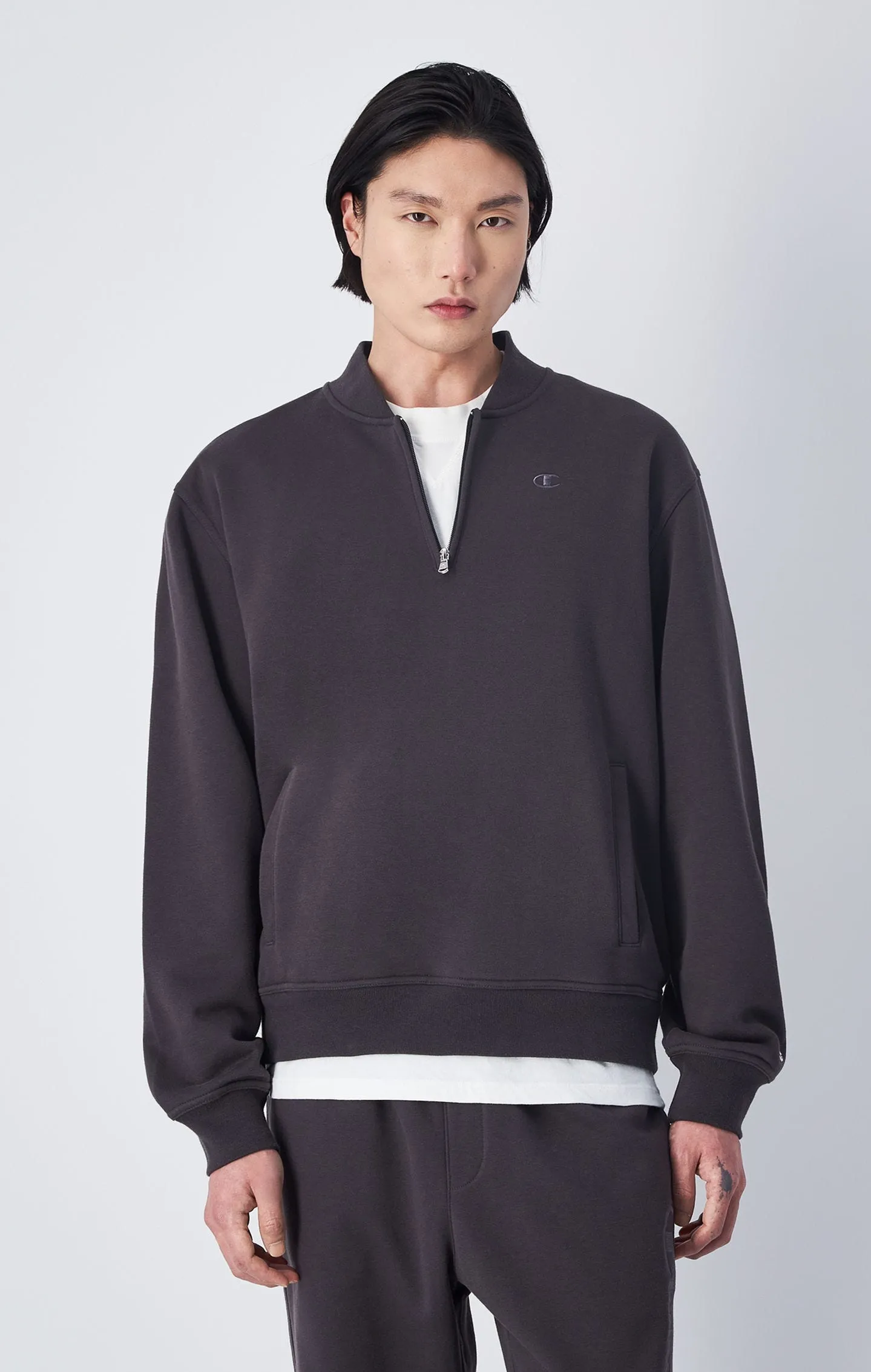 Sudadera con media cremallera y logotipo a tono